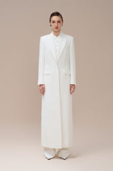 Tailored vest with tonal buttons and structured silhouette in textured jacquard fabric